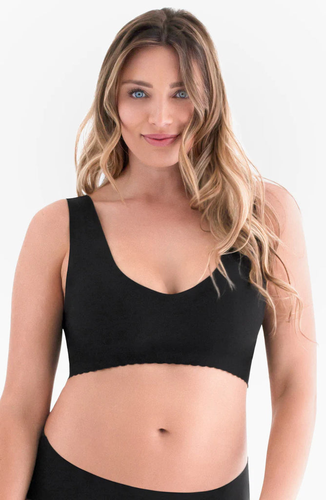 [Wireless support in our Comfy Seamless V-Neck Bra (in black) for your breastfeeding journey]